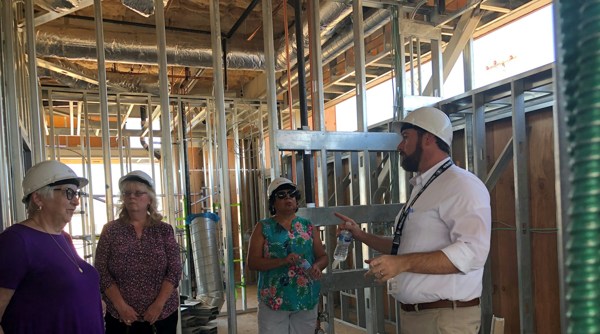 Board Members take a tour of the new West Side Family